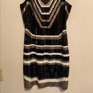 Black/white/bronze sequin mini dress, great for a guest at a wedding. Size small